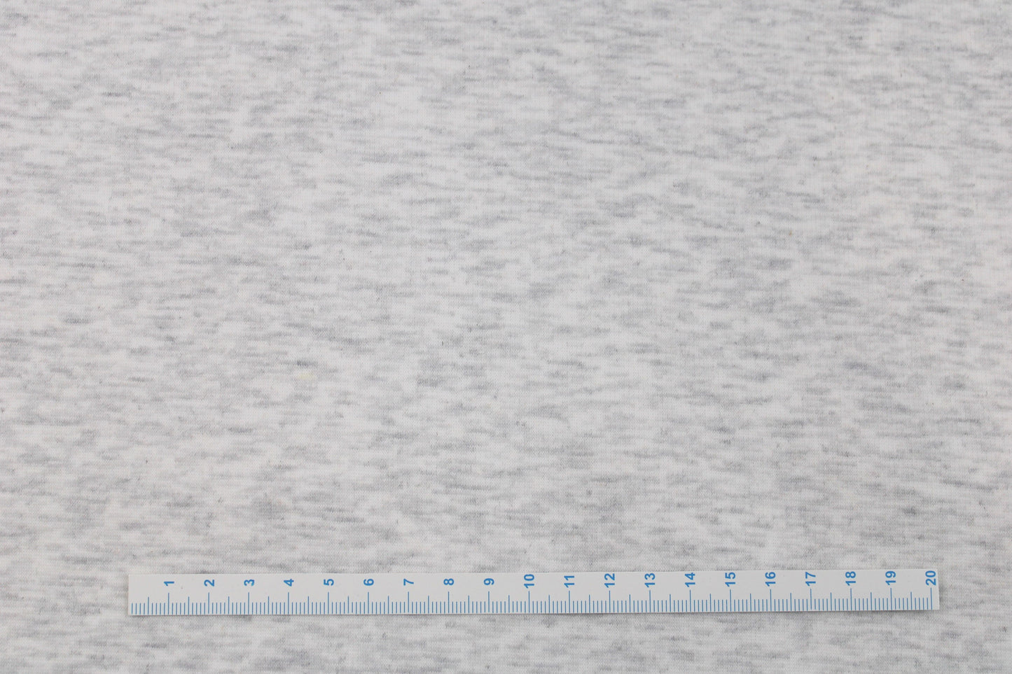 Alpenfleece Simon in wollweiß meliert mit kuschelig weißer Innenseite Maßstab