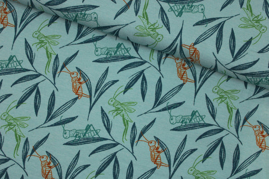 Türkis farbener Baumwolljersey mit Grashüpfern quer