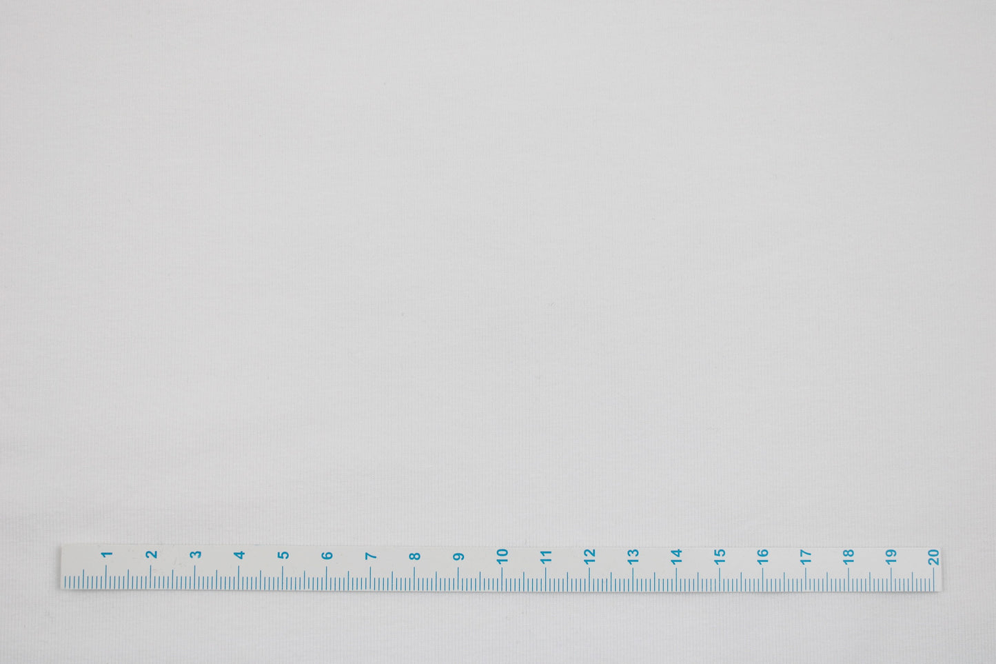 Baumwolljersey Vanessa in uni naturweiß Maßstab