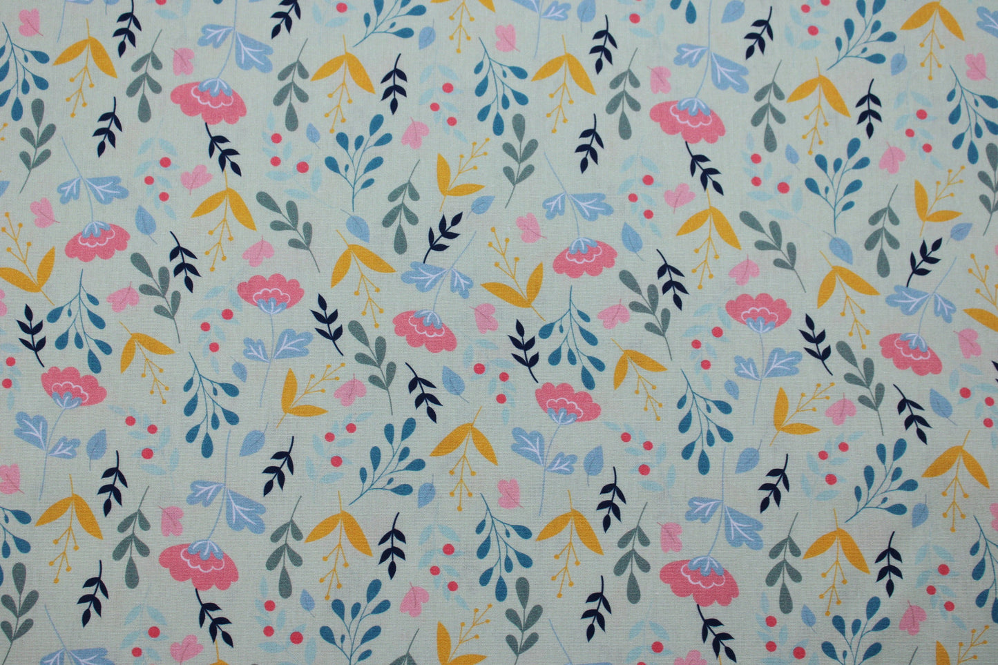Baumwollstoff Spring mit bunten Blumen auf hellgrünem Grund Detailbild