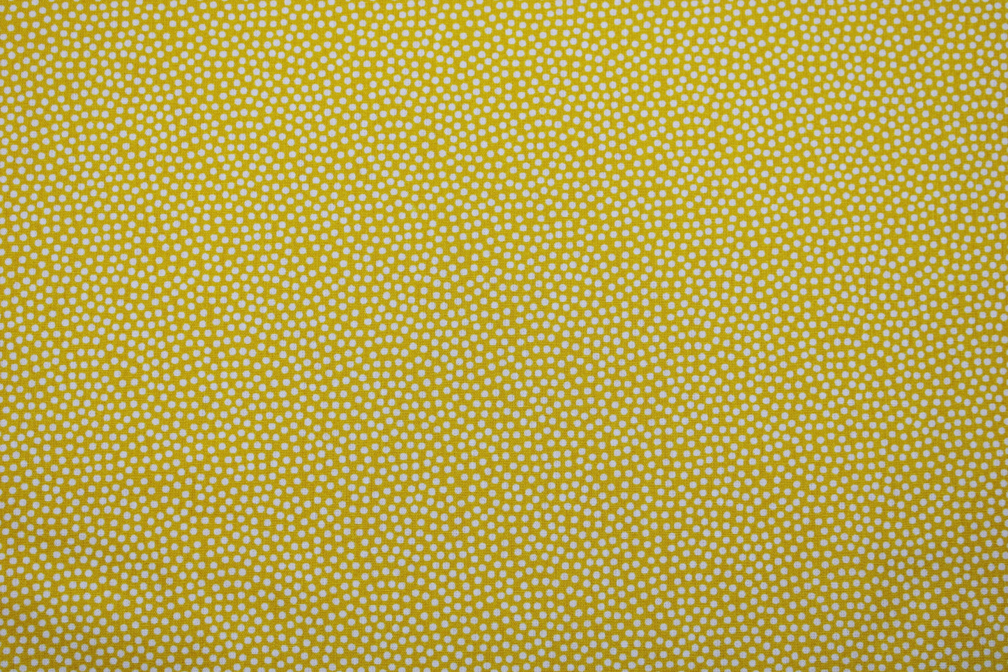 Baumwollstoff Dotty in gelb mit weißen Pünktchen Detailbild