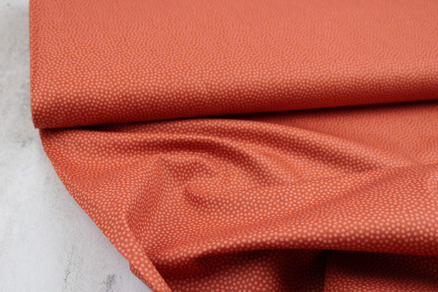 Baumwollstoff Dotty mit Pünktchen in terracotta Ballenansicht