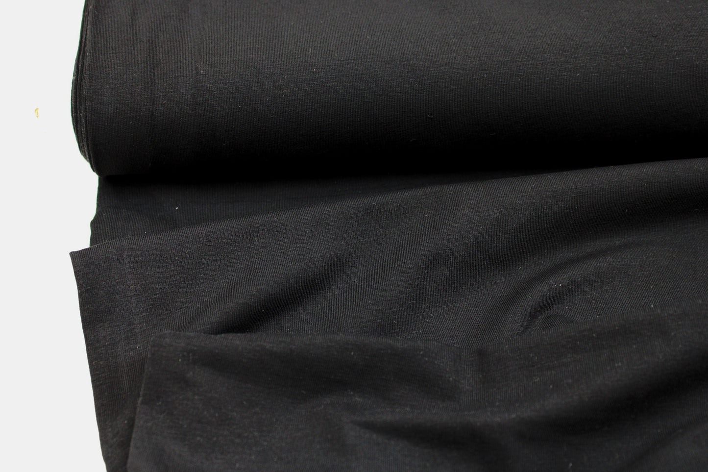 French Terry Sweatstoff Maike in uni Schwarz Ballenansicht