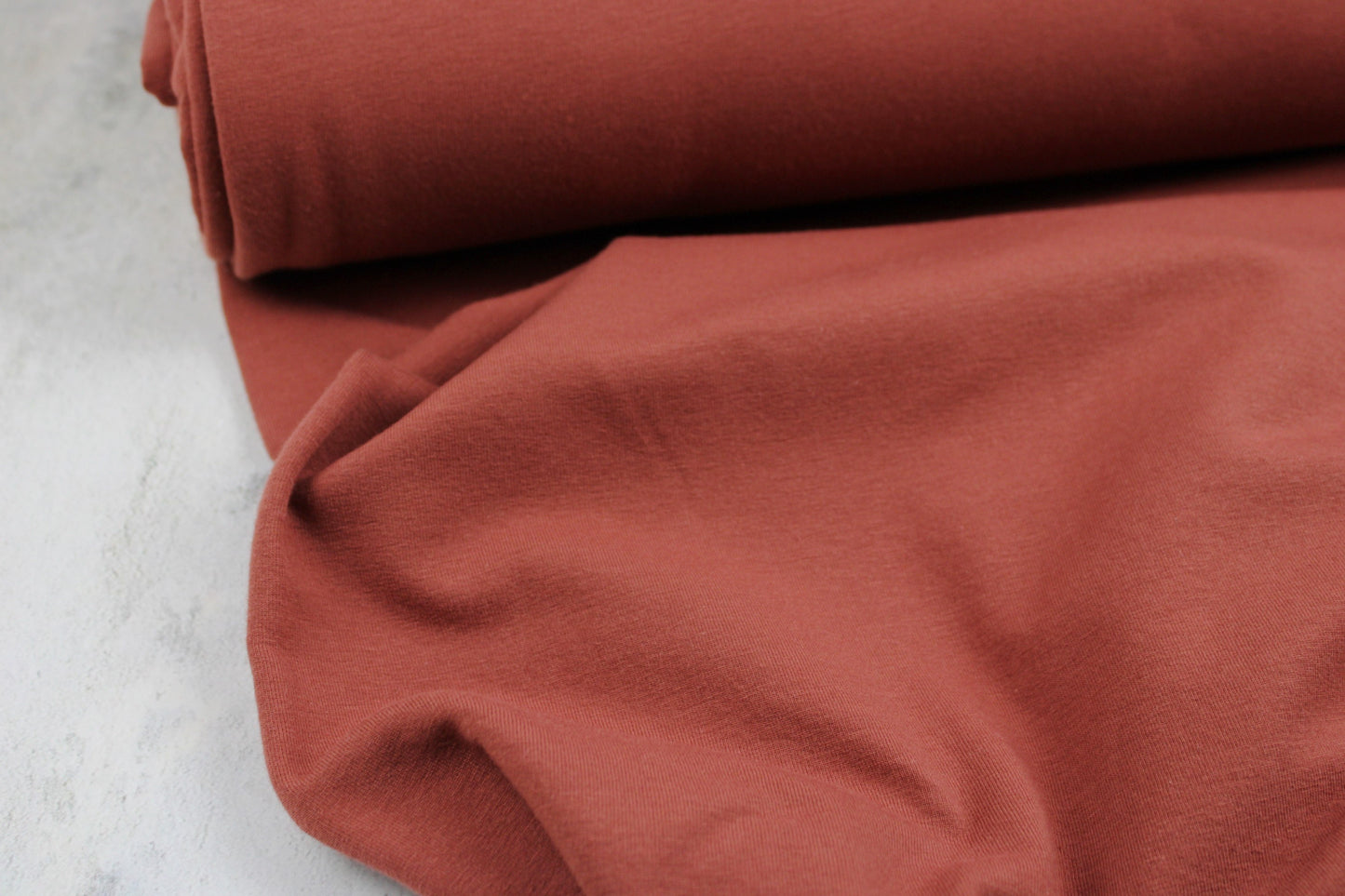 Sweatstoff Eike HW24/25 in uni terracotta Ballenansicht