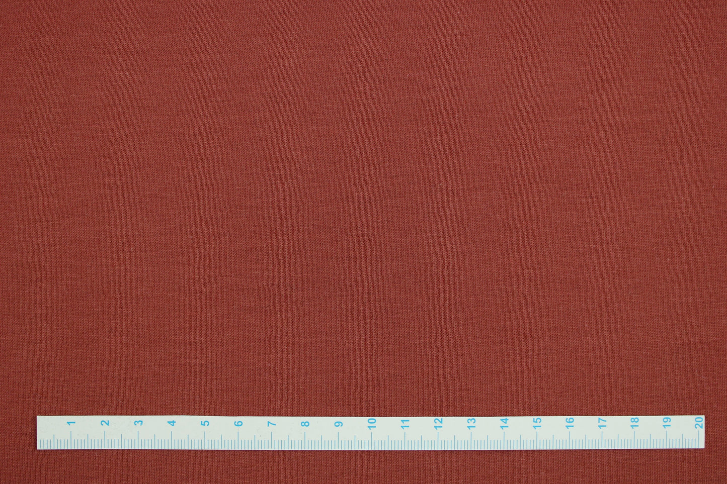 Sweatstoff Eike HW24/25 in uni terracotta Maßstab