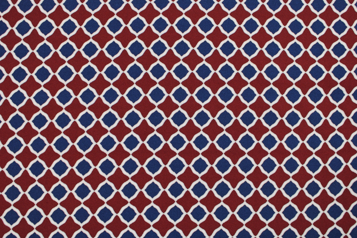 Viskosestretchstoff mit Retromuster in Rostot und Dunkelblau Detailbild