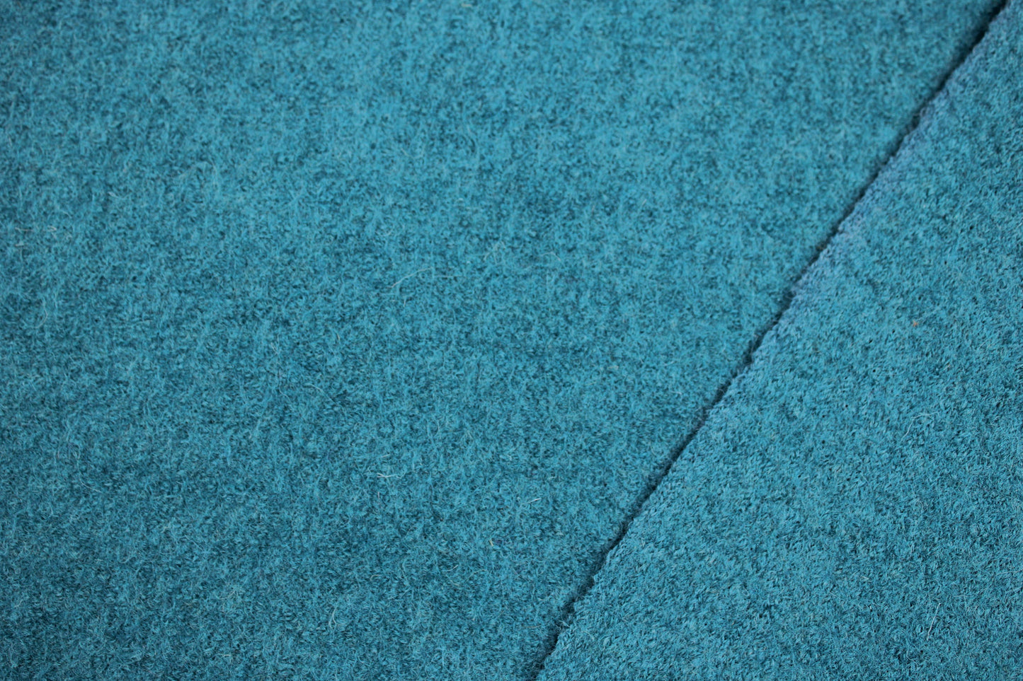 Wollwalk in uni petrol mit Innenseite