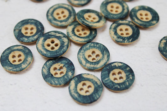 Knopf in Holzoptik mit Petrol farbenem Rand