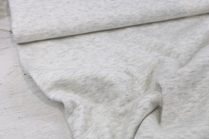 Alpenfleece Simon in wollweiß meliert mit kuschelig weißer Innenseite Ballenansicht