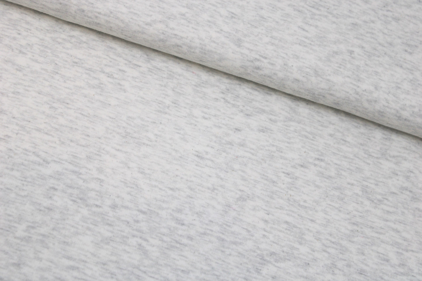 Alpenfleece Simon in wollweiß meliert mit kuschelig weißer Innenseite quer