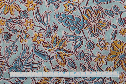 Baumwollbatist in Mint mit buntem Blumenmuster Maßstab