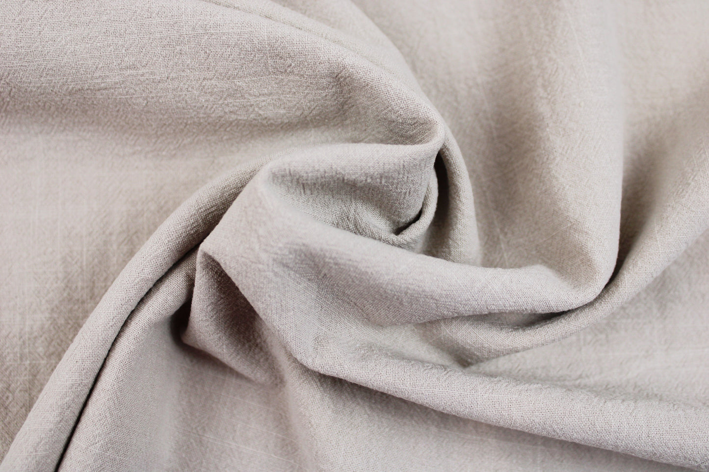 Baumwollstoff Franky mit Crepestruktur in Beige gedreht