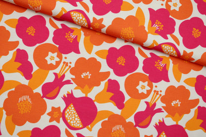Baumwolljersey mit Retroblumen in Orange- und Pinktönen quer