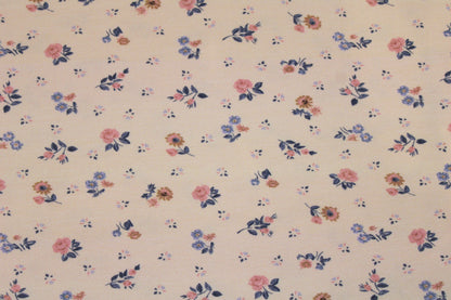 Baumwolljersey Flowers & Wood mit zarten Blümchen auf Creme farbenem Grund Detailbild