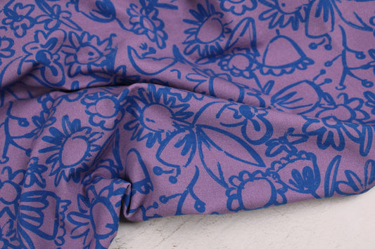 Baumwolljersey Lightness mit Blumenmuster in Lila und Blau