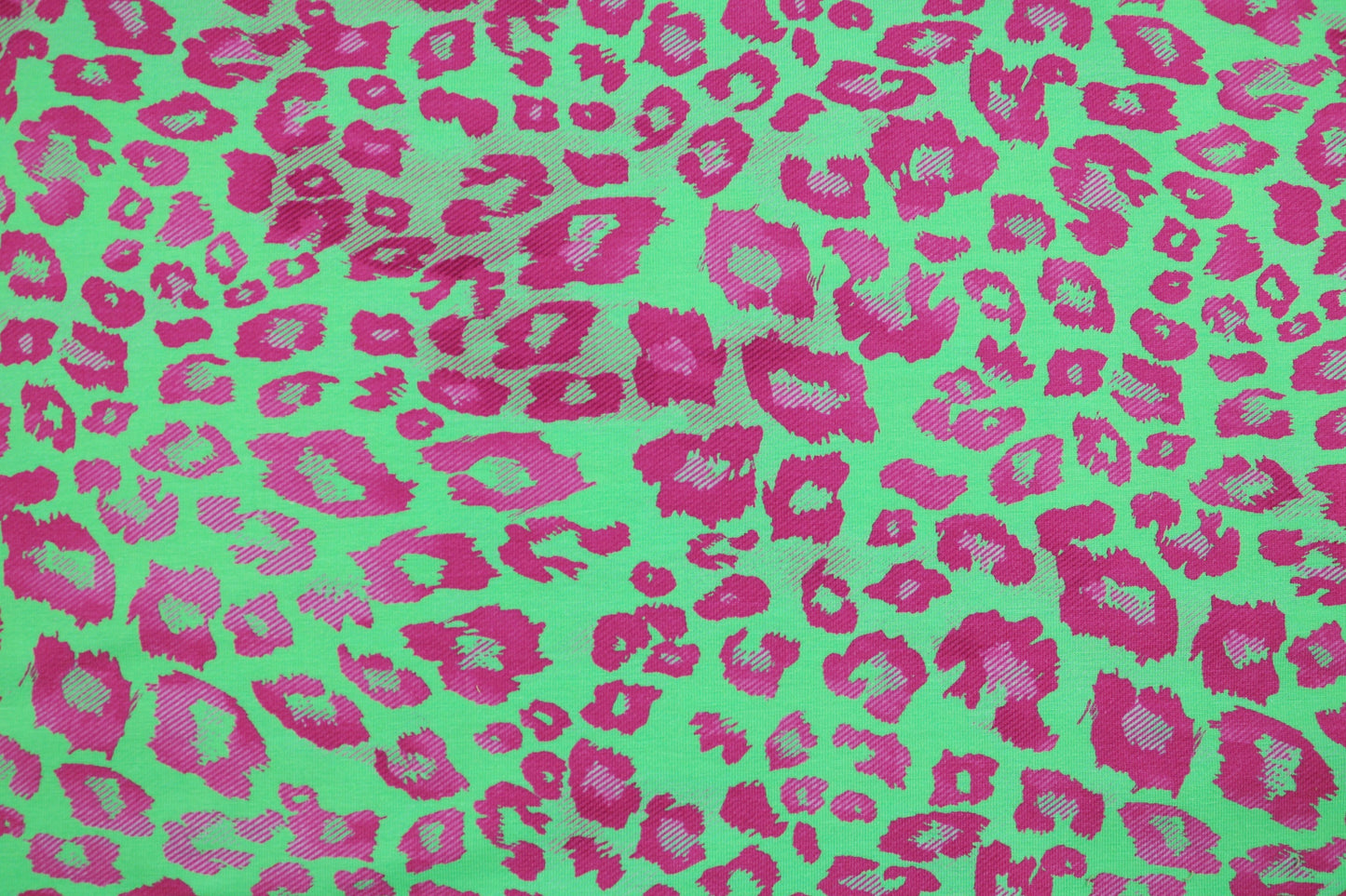 Baumwolljersey Madrid Leomuster Grün Pink Detailbild