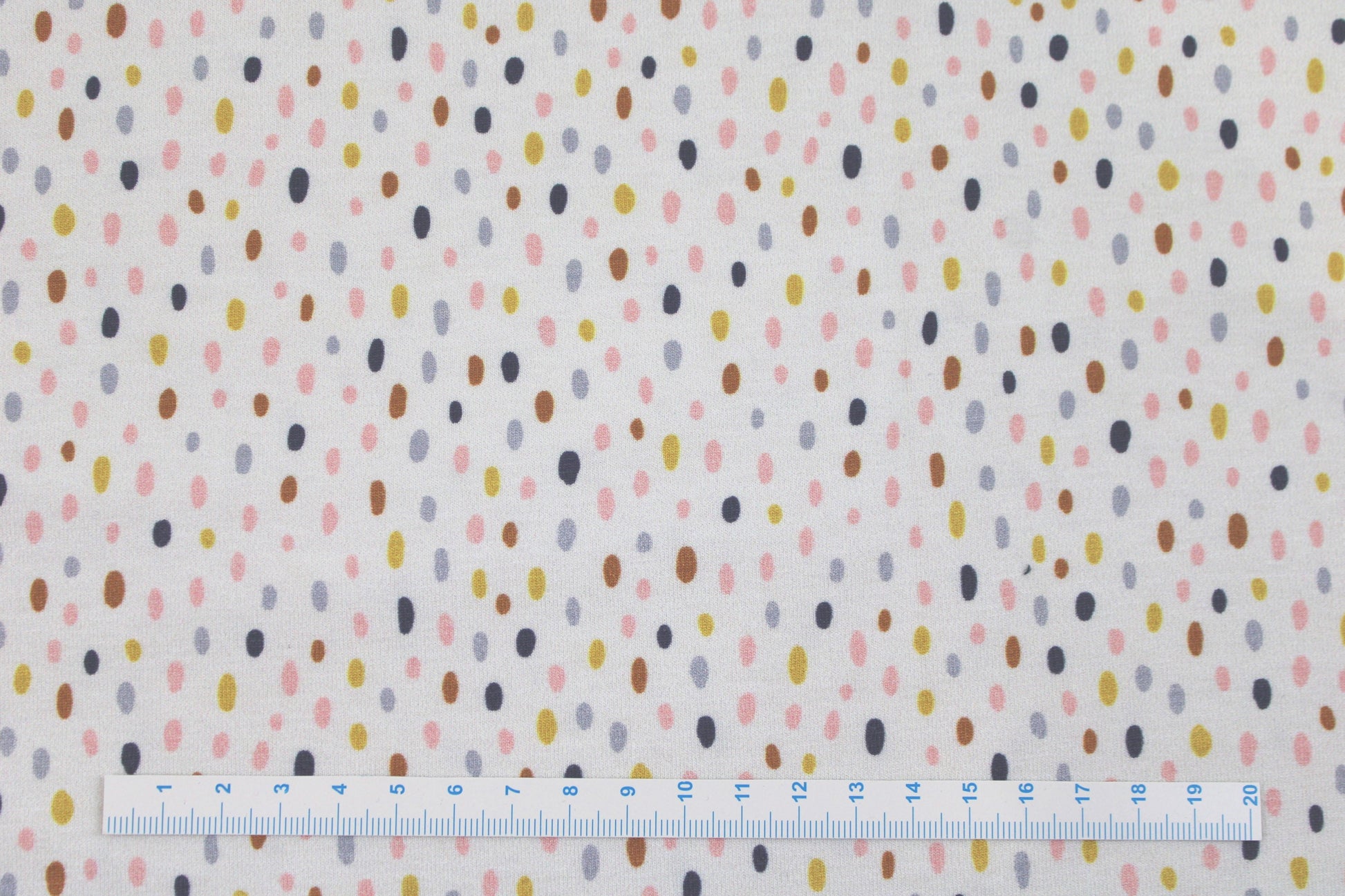 Heller Baumwolljersey Little Big mit bunten Tupfen Maßstab