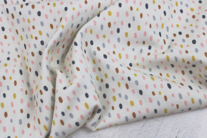 Heller Baumwolljersey Little Big mit bunten Tupfen