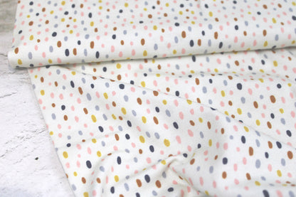 Heller Baumwolljersey Little Big mit bunten Tupfen Ballenansicht