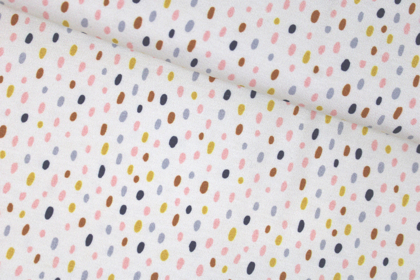 Heller Baumwolljersey Little Big mit bunten Tupfen quer