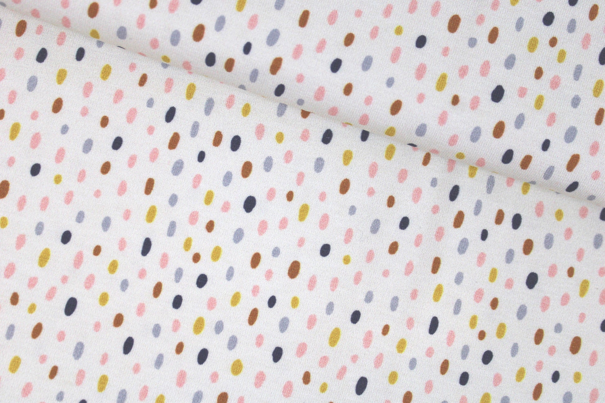 Heller Baumwolljersey Little Big mit bunten Tupfen quer