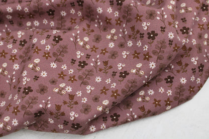 Dunkelrose farbener Baumwolljersey Winterbloom mit Streublümchen