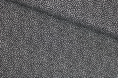 Baumwollstoff Dotty mit kleinen Pünktchen in schwarz auf Hellgrau quer