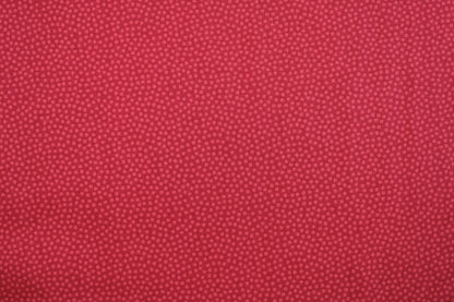 Baumwollstoff Dotty mit kleinen roten Pünktchen Ton in Ton Detailbild