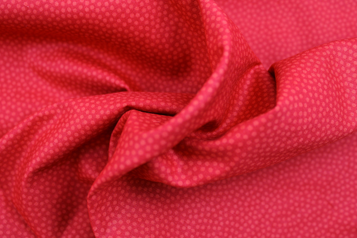 Baumwollstoff Dotty mit kleinen roten Pünktchen Ton in Ton gedreht
