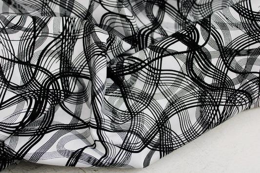 Baumwollstoff mit Linien aus der Inkwell-Reihe in Schwarz-Weiß