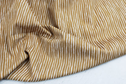 Baumwollstoff Sweet Mini Baby mit Streifen in Ecru und Ocker