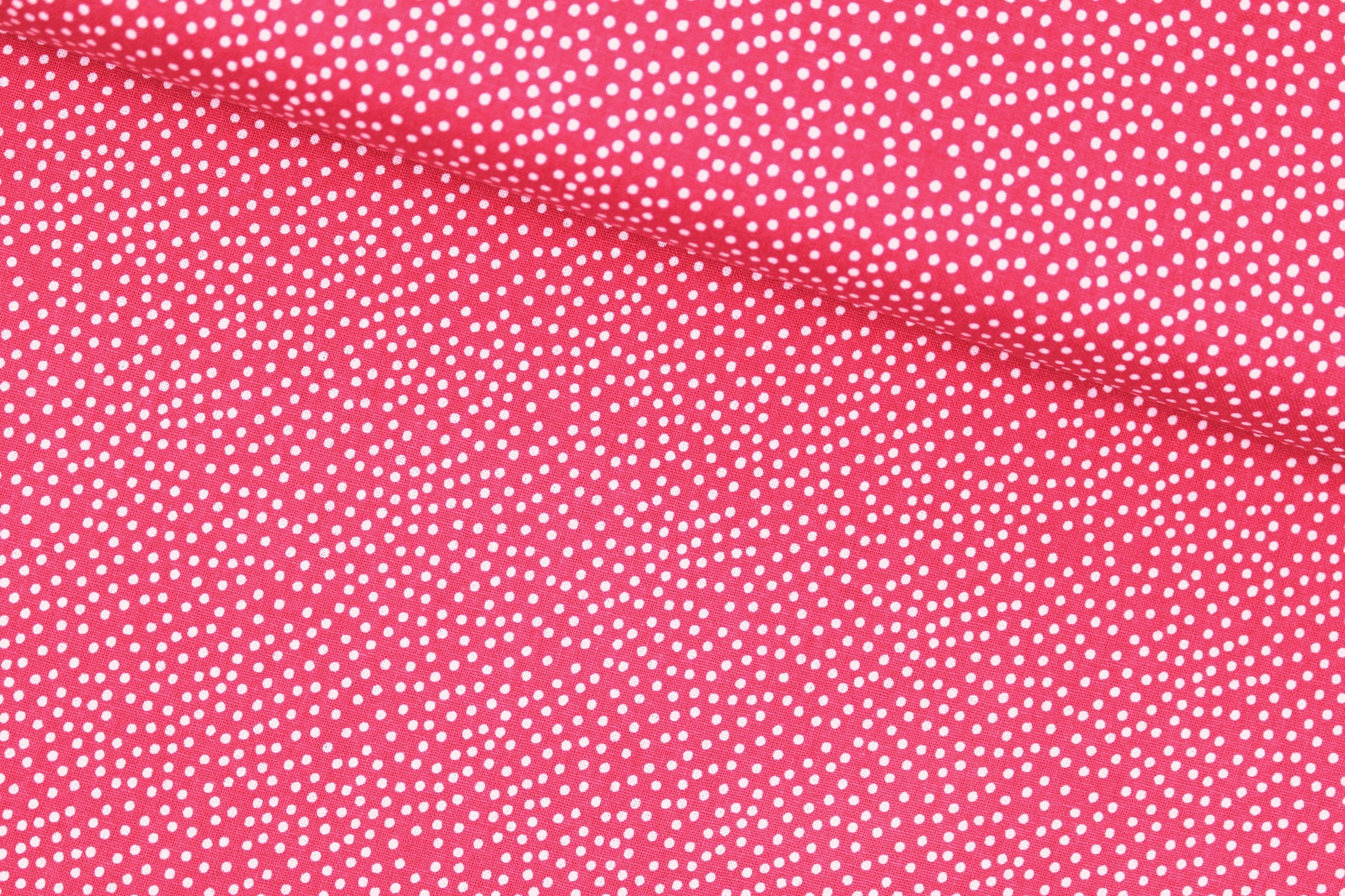Baumwollstoff Garden Pindot in Koralle mit kleinen weißen Pünktchen quer