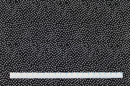 Schwarzer Baumwollstoff Garden Pindot mit kleinen weißen Pünktchen Maßstab