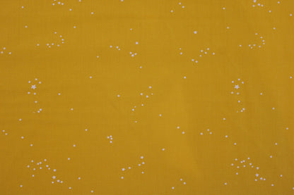 Baumwollstoff Glowdust Golden mit kleinen Sternen aus der Geobloom-Kollektion von Art Gallery Fabrics Detailbild