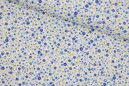 Baumwollstoff Minis mit kleinen Blümchen in Blau auf weißem Grund quer