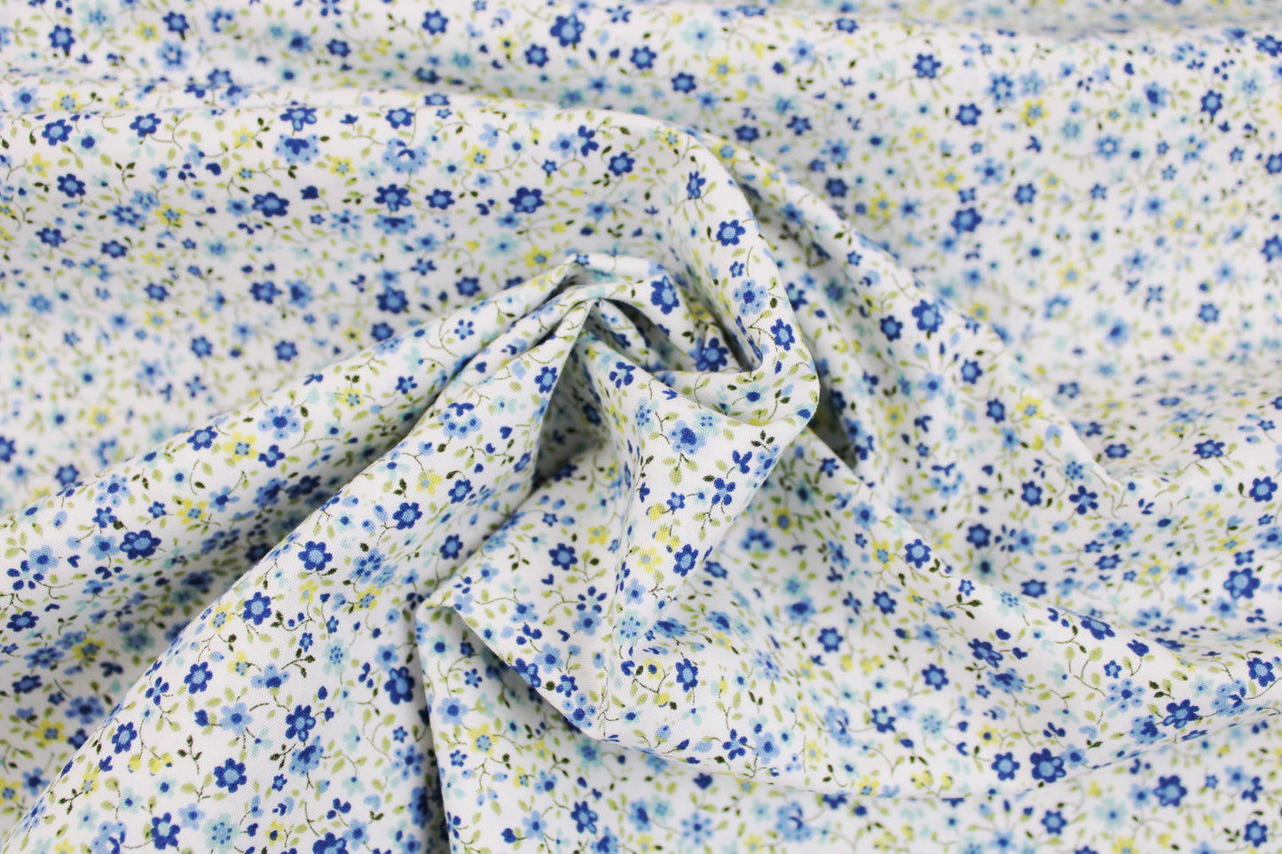 Baumwollstoff Minis mit kleinen Blümchen in Blau auf weißem Grund Maßstab