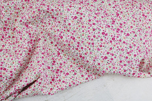 Baumwollstoff Minis mit kleinen Blümchen in Pink auf weißem Grund