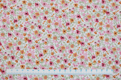 Baumwollstoff Natura mit kleinen Blümchen in Rosa und Orange Maßstab