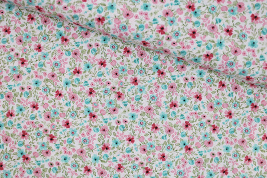 Baumwollstoff Natura mit kleinen Blümchen in Rosa und Türkis quer