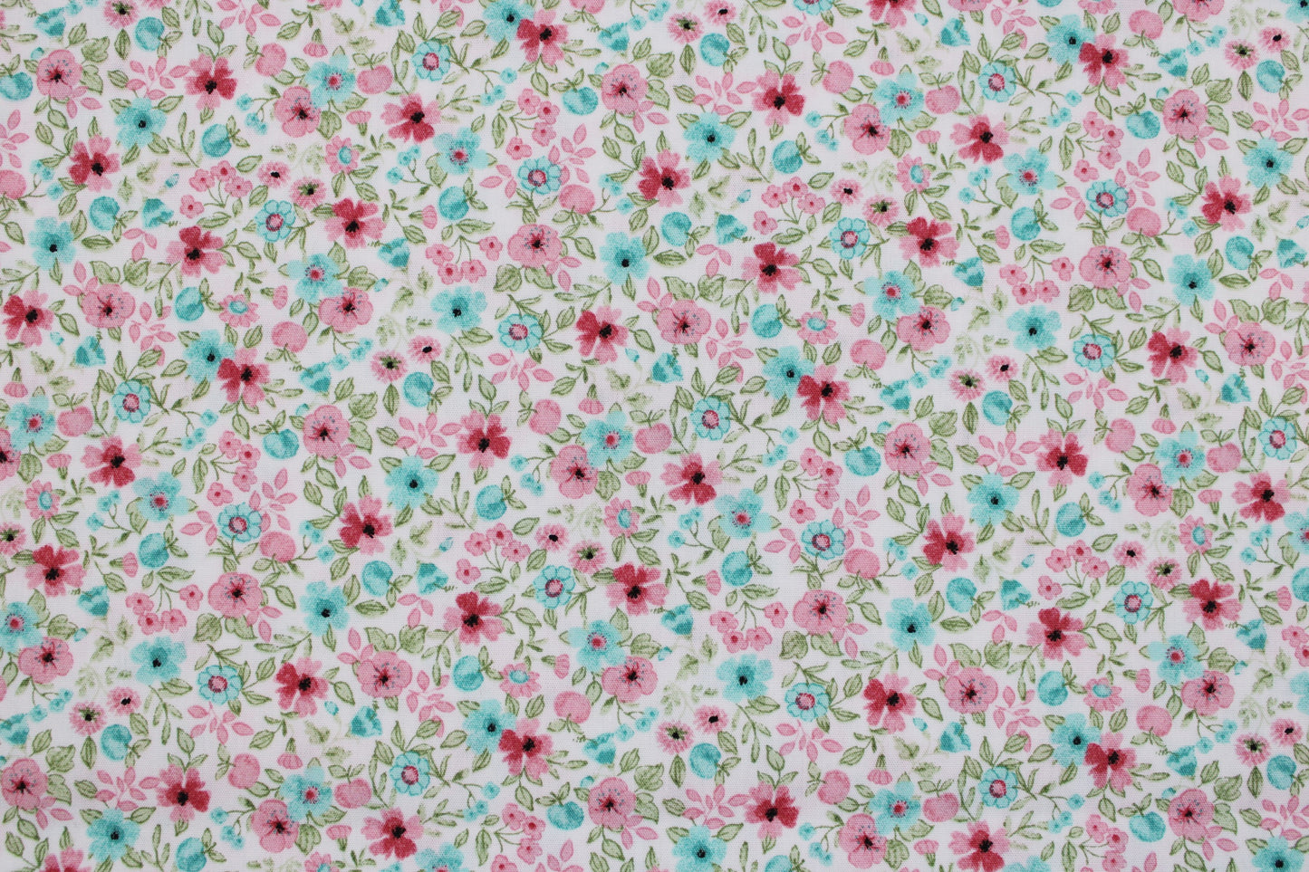 Baumwollstoff Natura mit kleinen Blümchen in Rosa und Türkis Detailbild
