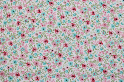 Baumwollstoff Natura mit kleinen Blümchen in Rosa und Türkis Detailbild