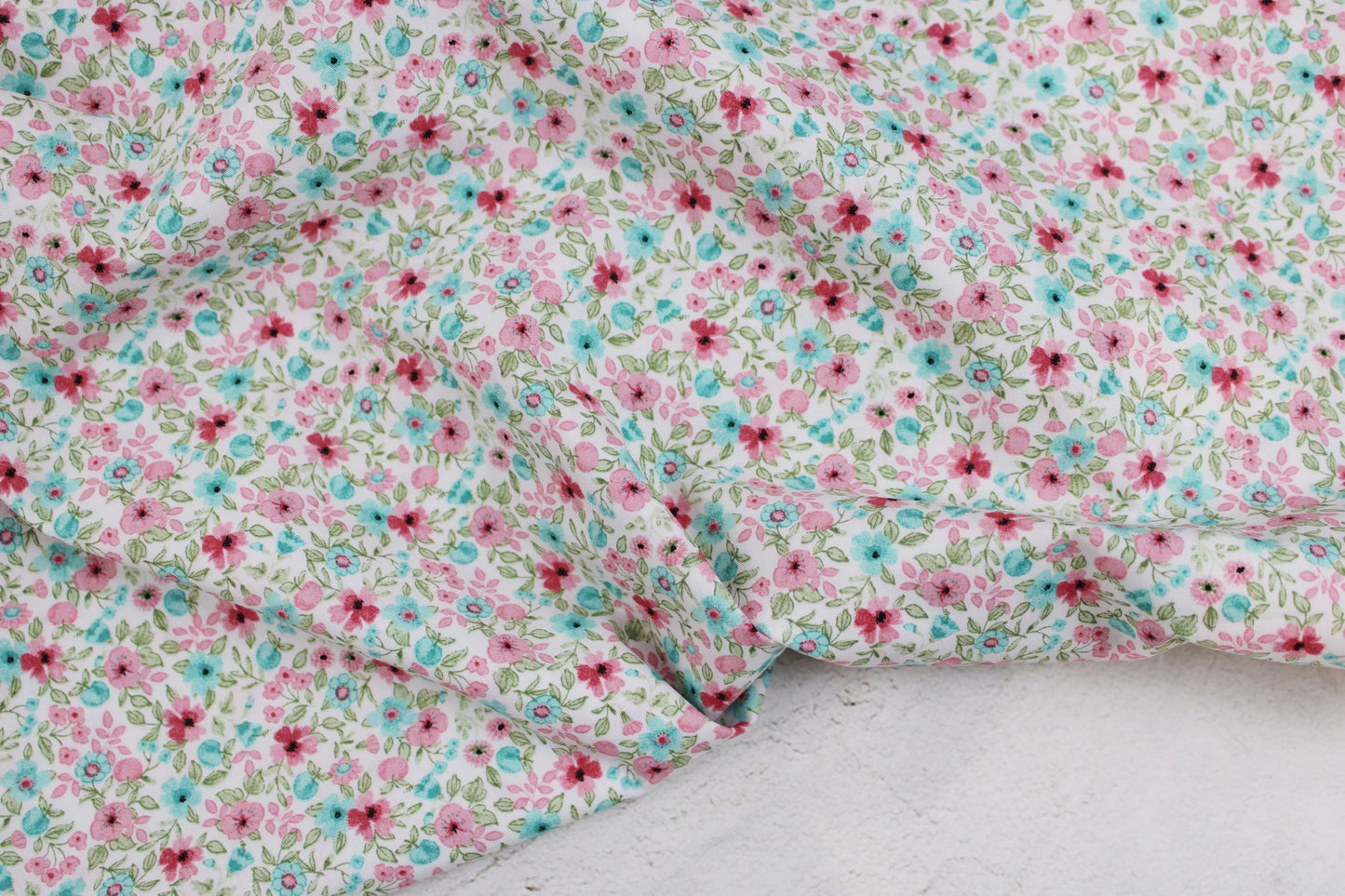 Baumwollstoff Natura mit kleinen Blümchen in Rosa und Türkis