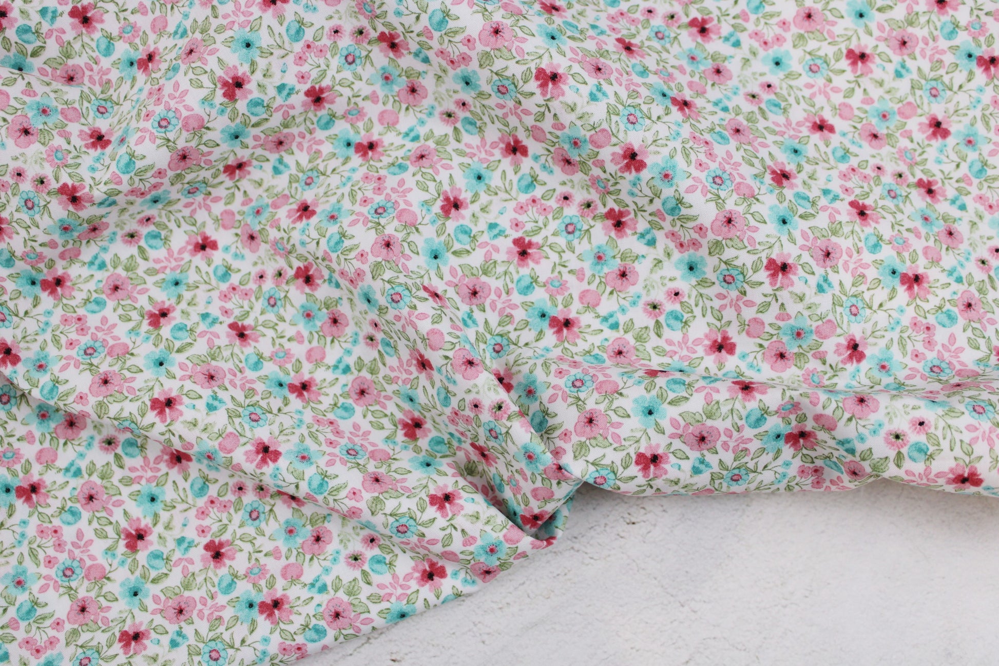Baumwollstoff Natura mit kleinen Blümchen in Rosa und Türkis