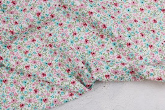 Baumwollstoff Natura mit kleinen Blümchen in Rosa und Türkis