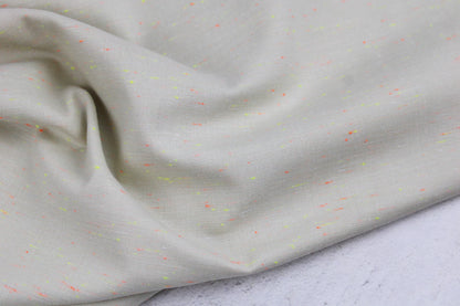 Baumwollstoff Neon Neppy mit kleinen Neonfäden in Gelb und Orange