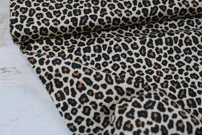 Baumwollstoff Tim mit klassischem Leomuster in Beige Ballenansicht