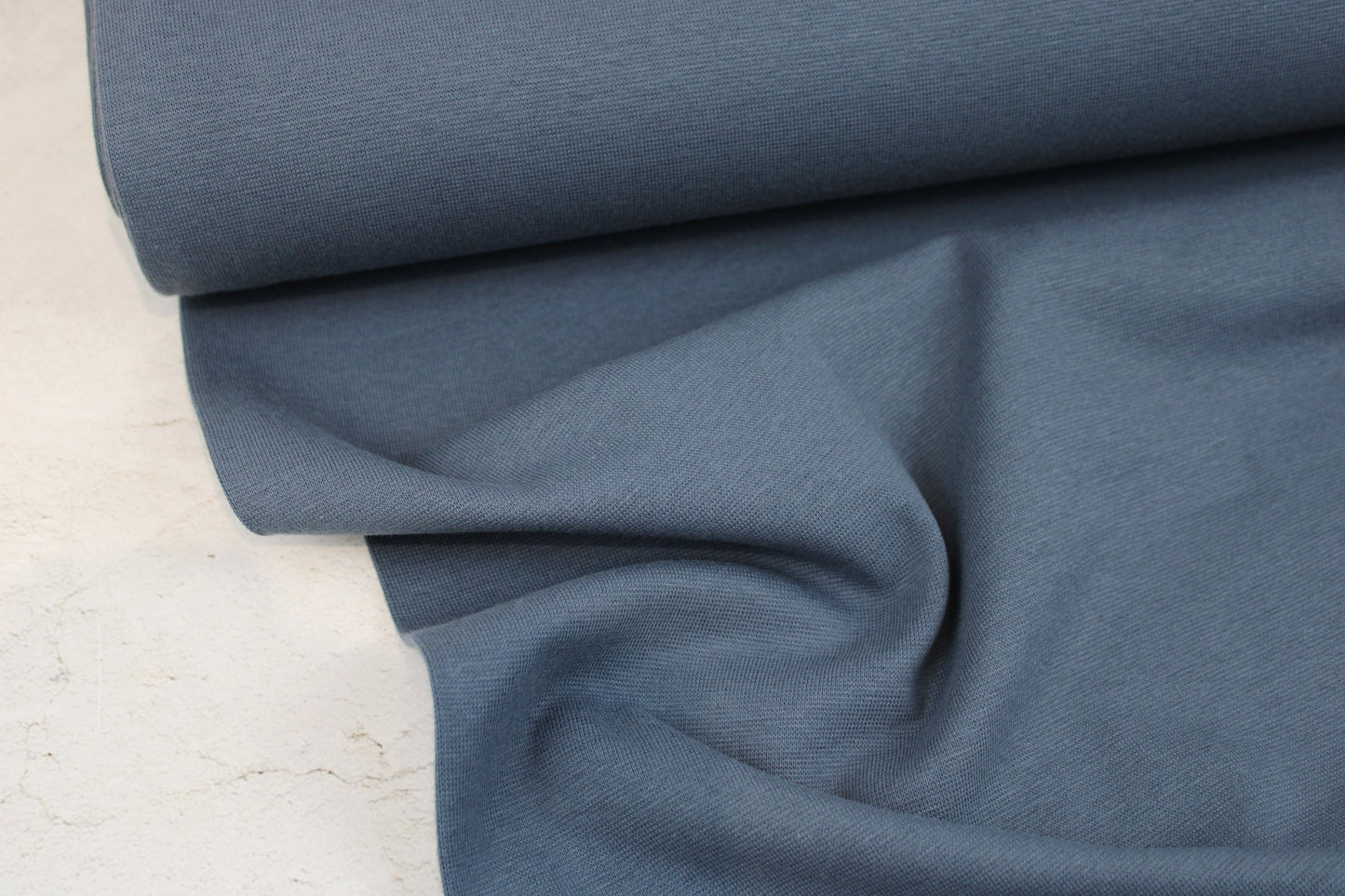 Bündchenstoff Heike in uni Jeansblau Ballenansicht