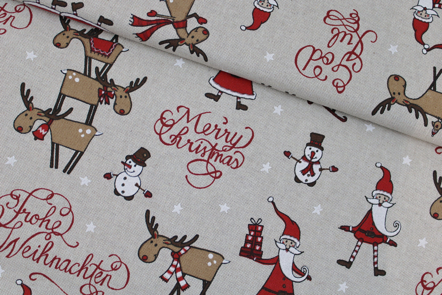 Canvasstoff Emil mit fröhlichen Weihnachtsmotiven auf beigem Grund quer