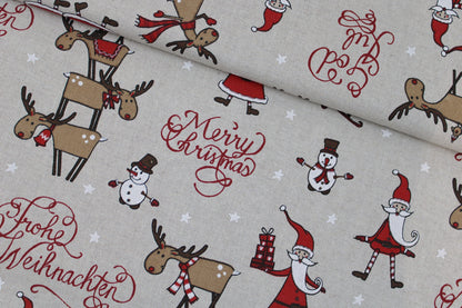 Canvasstoff Emil mit fröhlichen Weihnachtsmotiven auf beigem Grund quer