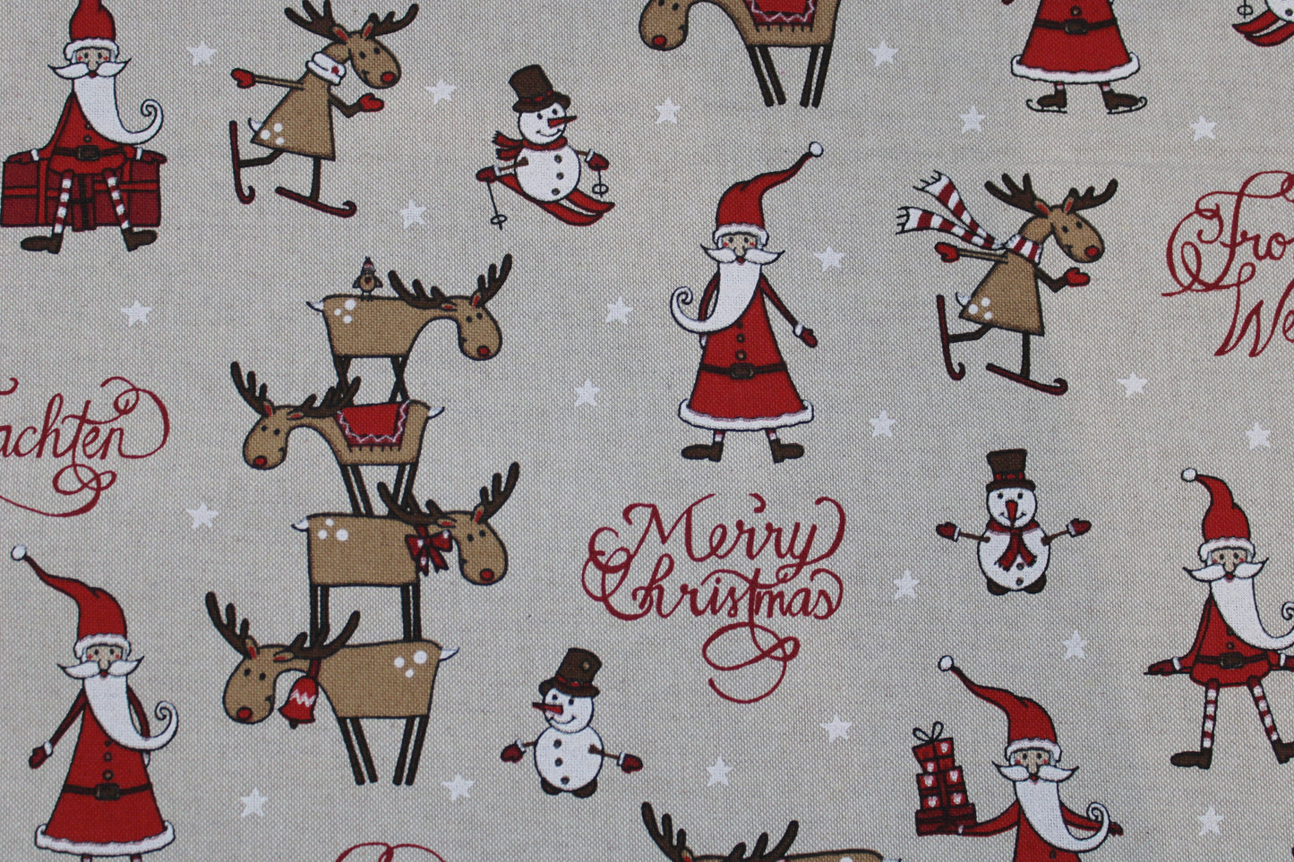 Canvasstoff Emil mit fröhlichen Weihnachtsmotiven auf beigem Grund Detailbild